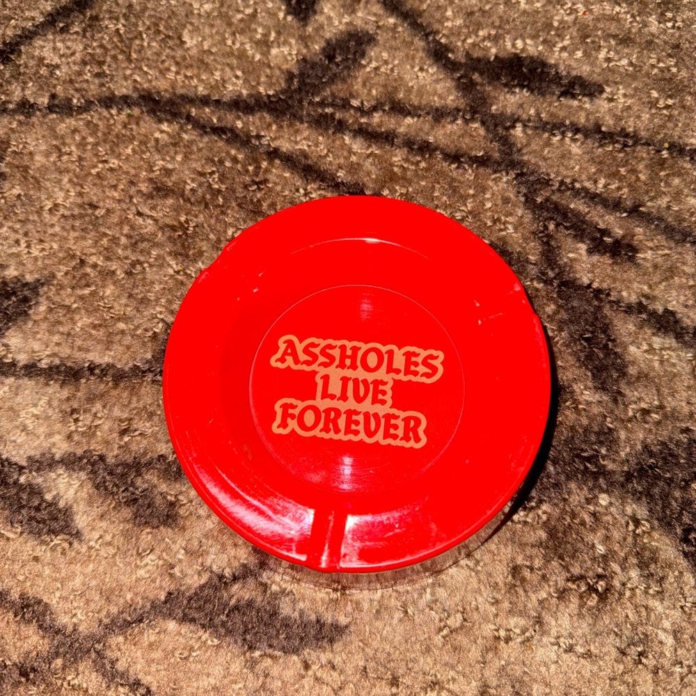 Assholes Live Forever Red Plastic Ashtray- New